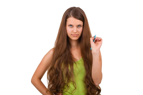 Girl posing with pen in studio — Stock Photo, Image