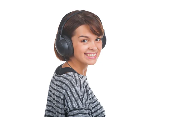 Csinos, fiatal lány hallgat zenét — Stock Fotó