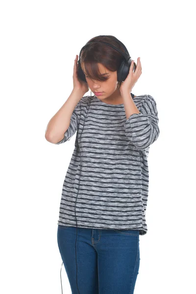 Pretty young girl listening music — Stock Photo, Image