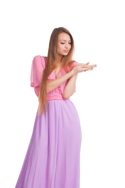 Hübsche Frau im rosa Kleid. — Stockfoto