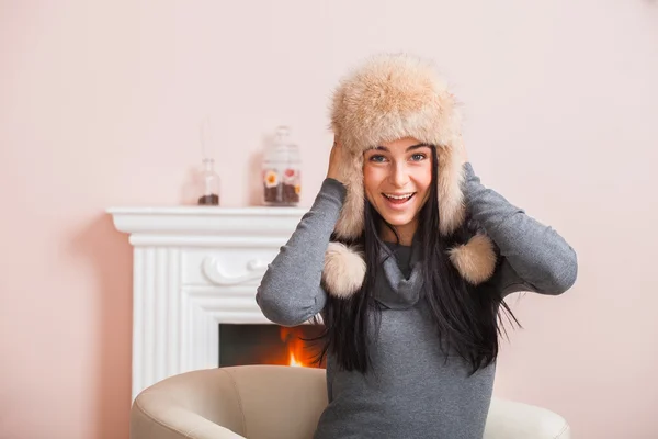 Girl in white fur hat — Stock Photo, Image