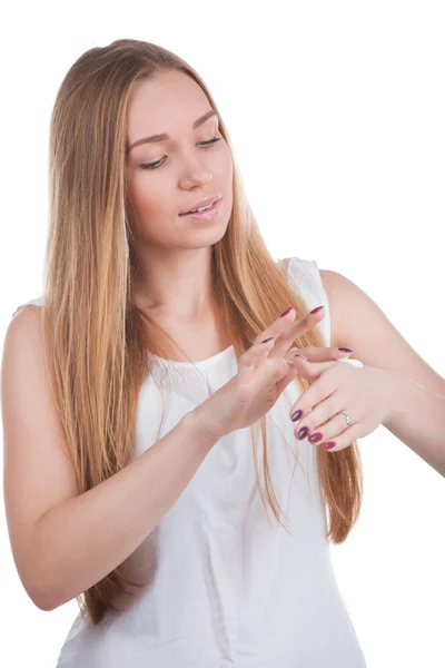 Woman applies cream on hands — Stock Photo, Image