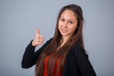 Başparmağını Yukarı Gösteren Kadın