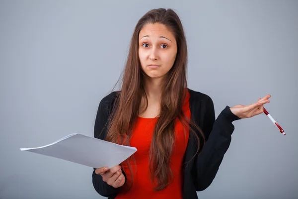 Girl with paper and pen — Stock Photo, Image