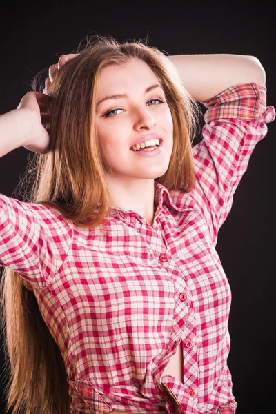 Woman in checkered shirt — Stock Photo, Image