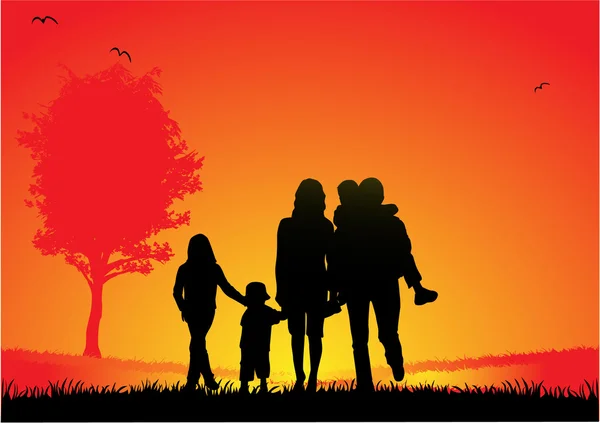 Familia feliz y una hermosa puesta de sol — Archivo Imágenes Vectoriales