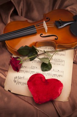 Beautiful roses and violin! clipart