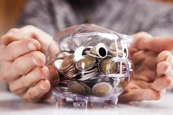 Man holding piggy bank! — Stock Photo, Image