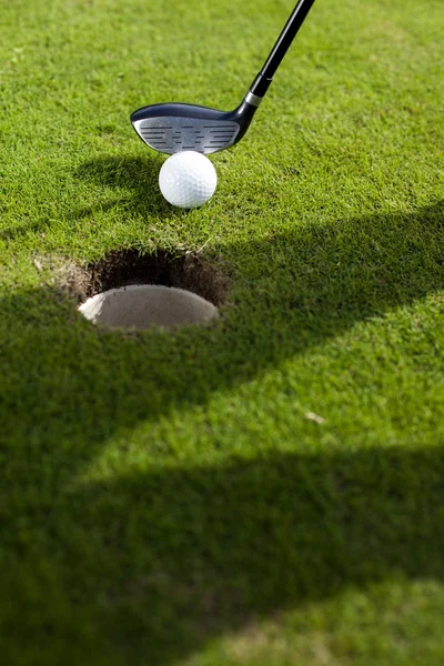 Closeup of hole on golf field — Stock Photo, Image