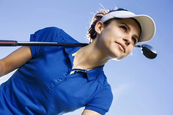 Portrait of a woman playing golf — Stock Photo, Image