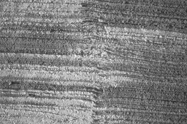 The pattern on the cement surface created by using a broom to draw flicks.wood texture background.