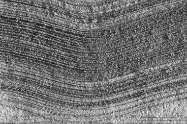 The pattern on the cement surface created by using a broom to draw flicks.wood texture background.