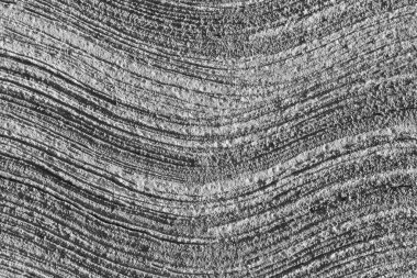 The pattern on the cement surface created by using a broom to draw flicks.wood texture background.