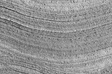 The pattern on the cement surface created by using a broom to draw flicks.wood texture background.