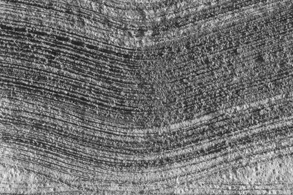 Çimento yüzeyindeki şablon bir süpürge kullanılarak yaratılmış. Flicks.wood doku arka planı.