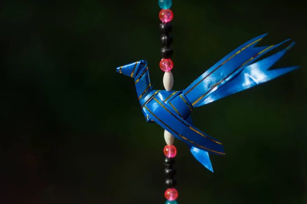 The ribbon was used to create a bird shape.