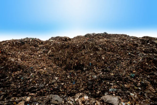 A mountain of trash, a heap of plastic waste from urban communities and large industrial zones that does not decompose.