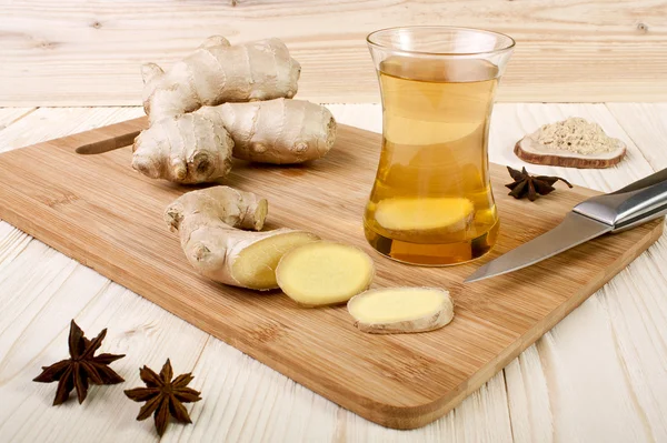 Ginger tea on a wooden background — Stock Photo, Image