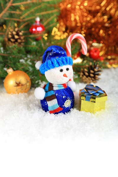 Christmas composition with snow and a snowman — Stock Photo, Image