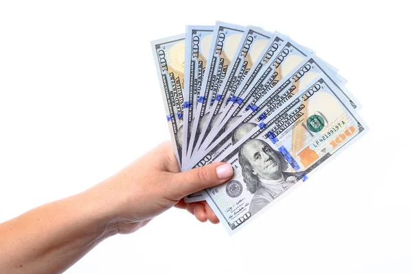 Hand holding a new hundred dollar bills U.S. folded like a fan, — Stock Photo, Image