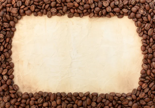 Background from coffee beans and old paper Stock Photo