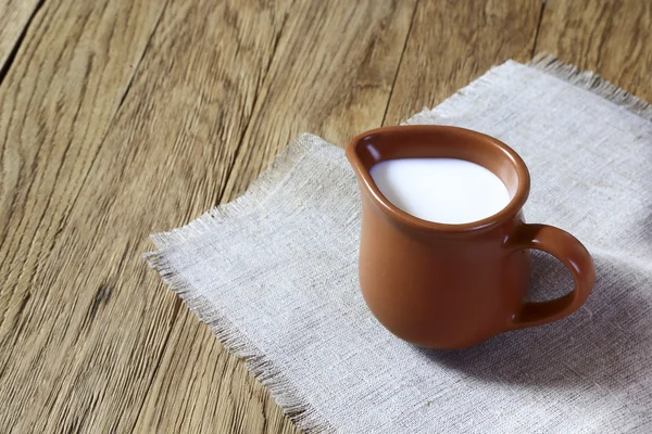 Leche en una jarra — Foto de Stock