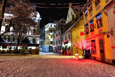 Christmas night in Old Riga in Latvia clipart