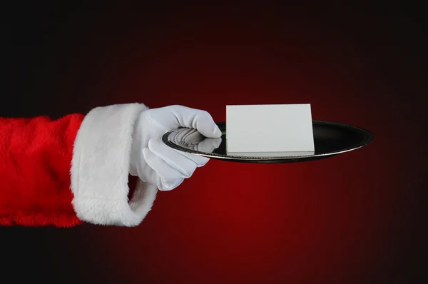 Papai Noel com bandeja e cartão em branco — Fotografia de Stock
