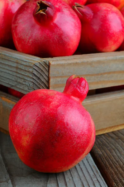 Pomegranates on Wood — Stock Photo, Image