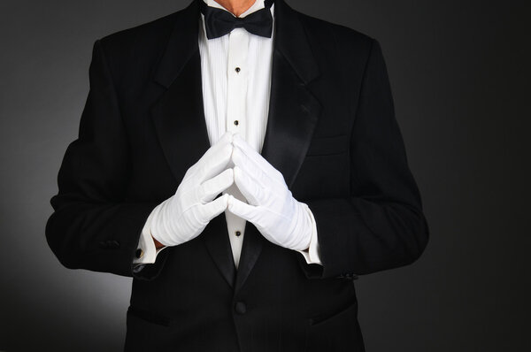 Man in Tuxedo with Hands in Front