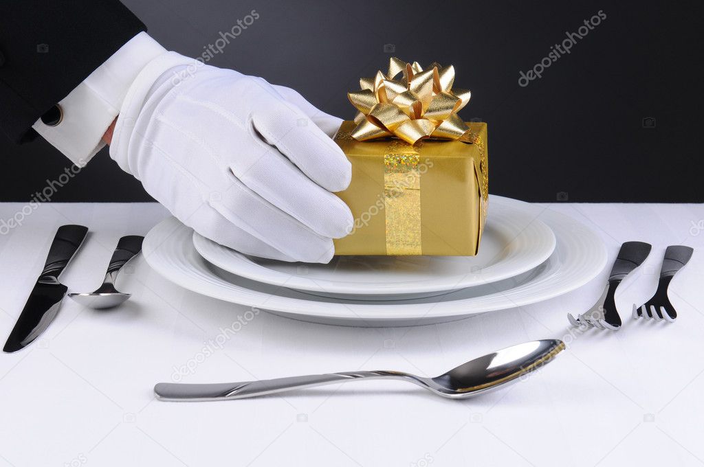 Waiter Setting Present on Plate