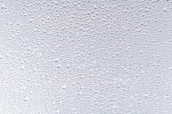 Gotas de água no fundo metálico — Fotografia de Stock