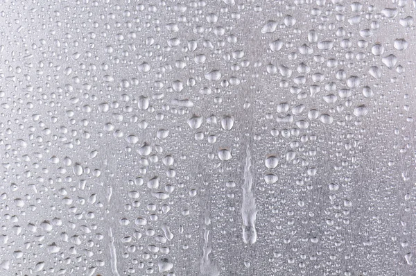 Water druppels op metaal — Stockfoto