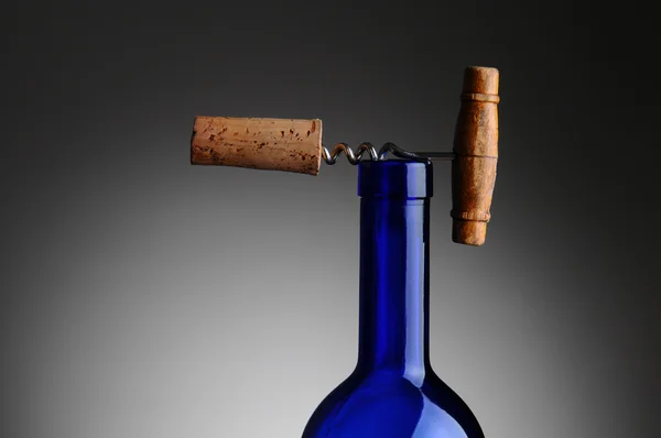 Corkscrew and Cork on Top of Wine Bottle — Stock Photo, Image