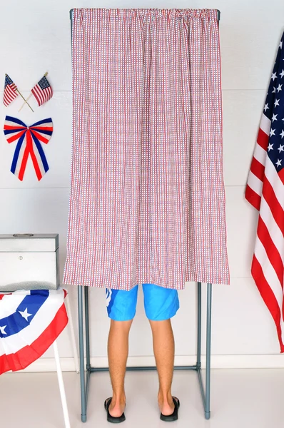 Young Voter in Voting Booth