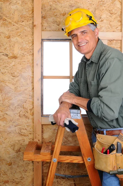 Contractor Leaning on Ladder — Stock Photo, Image