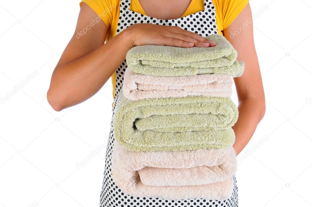 Housewife Holding a Stack of Towels