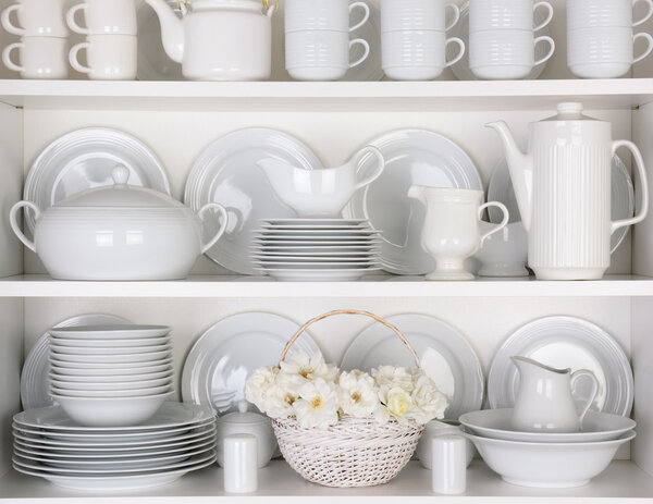 White Plates in Cupboard