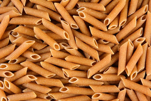 Celozrnný penne rigate — Stock fotografie