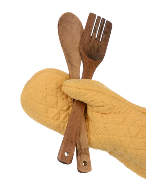 Horno Mitt Holding Cuchara de madera y tenedor —  Fotos de Stock