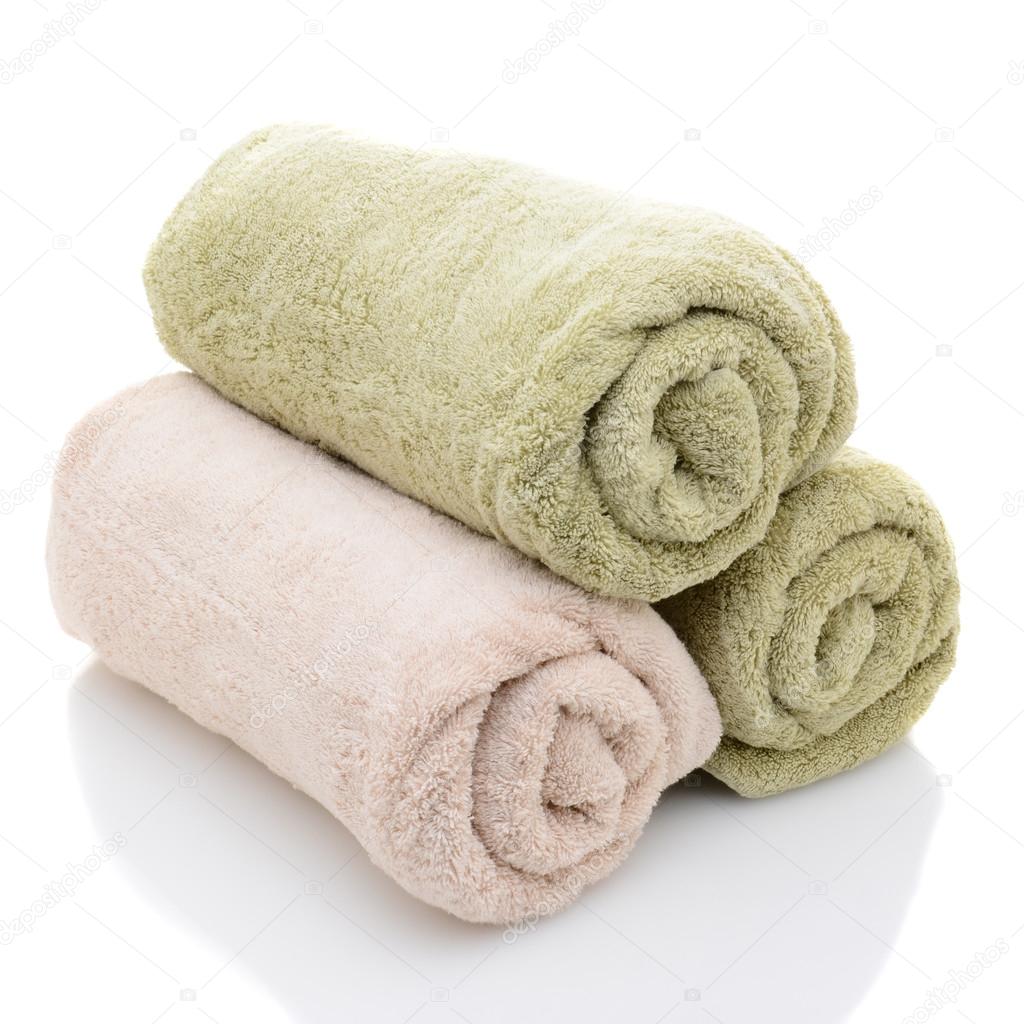 Three Rolled Bath Towels