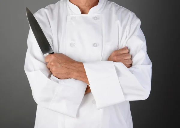 Koch hält Messer in der Hand — Stockfoto