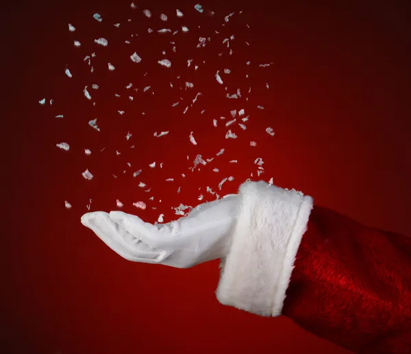 Santa fånga snöflingor — Stockfoto