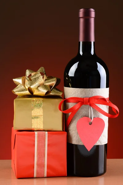 Wine Bottle and Valentines Presents — Stock Photo, Image