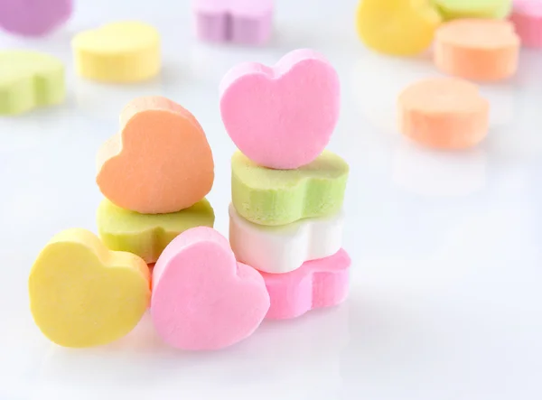 Candy Hearts on White With Reflection — Stock Photo, Image