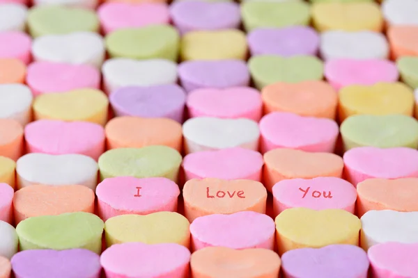 Kocham cię na serca cukierków — Zdjęcie stockowe