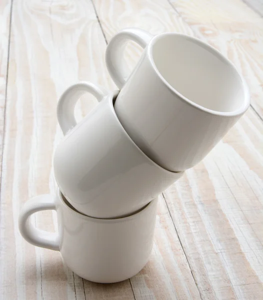 Tres tazas blancas apiladas — Foto de Stock