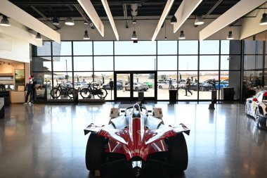CARSON, CALIFORNIA - 11 MAY 2022: Interior of the Porsche Experience Center with window looking out towards the 53 acre track.