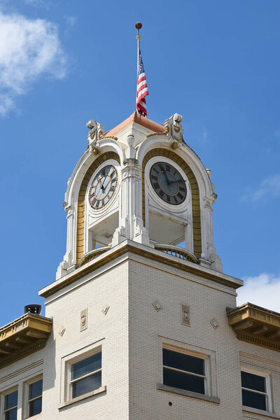 SANTA ANA, CALIFORNIA - AUGUST 27, 2018: Closeup of the Clock Tower on the W. H. Spurgeon Building. 
