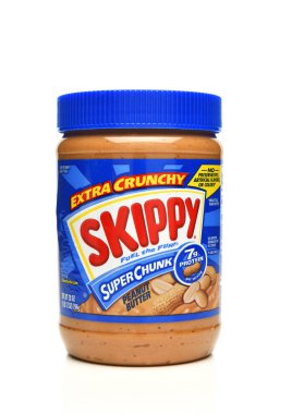 IRVINE, CALIFORNIA - 15 JUL 2022: A jar of Skippy Extra Crunch Super Chunk Peanut Butter.
